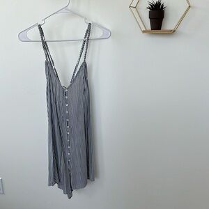 Pinstripe romper. Open back. New with tags. Size small.